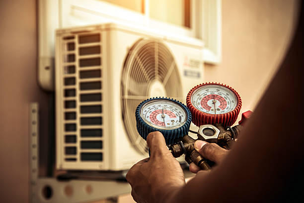 Professional Hvac technician working in Weston, MA